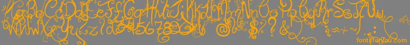 HolidayHome-Schriftart – Orangefarbene Schriften auf grauem Hintergrund