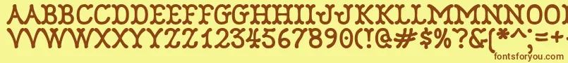 Robinne Font – Brown Fonts on Yellow Background