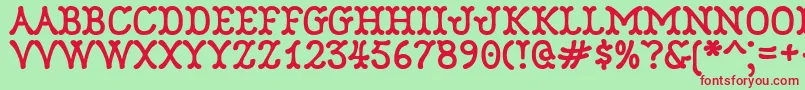 Robinne Font – Red Fonts on Green Background