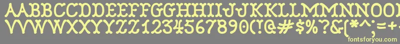 Robinne Font – Yellow Fonts on Gray Background