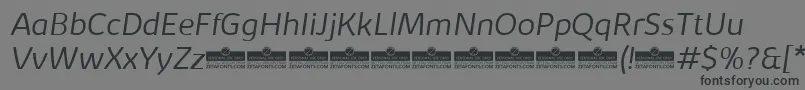 Шрифт KabrioLightItalicTrial – чёрные шрифты на сером фоне