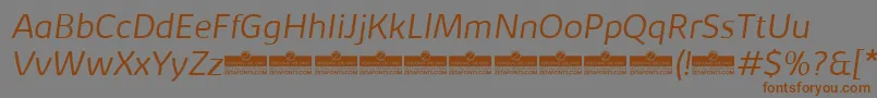 Шрифт KabrioLightItalicTrial – коричневые шрифты на сером фоне