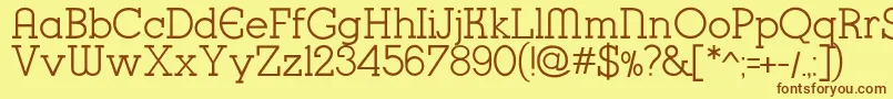 K22KarnakDeco Font – Brown Fonts on Yellow Background