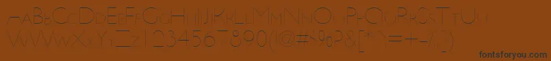 UltimapdbaHairlinesmallcap-Schriftart – Schwarze Schriften auf braunem Hintergrund