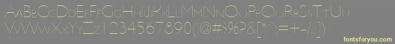 UltimapdbaHairlinesmallcap-Schriftart – Gelbe Schriften auf grauem Hintergrund