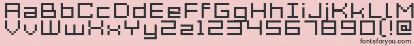 Fonte Acme7WideXtnd – fontes pretas em um fundo rosa
