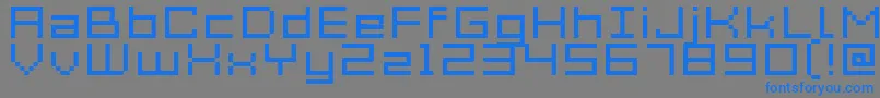 Acme7WideXtnd-fontti – siniset fontit harmaalla taustalla