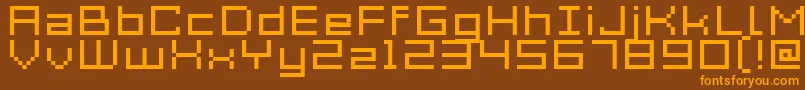 フォントAcme7WideXtnd – オレンジ色の文字が茶色の背景にあります。