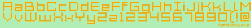 フォントAcme7WideXtnd – オレンジの文字が緑の背景にあります。