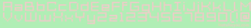 Acme7WideXtnd-fontti – vaaleanpunaiset fontit vihreällä taustalla