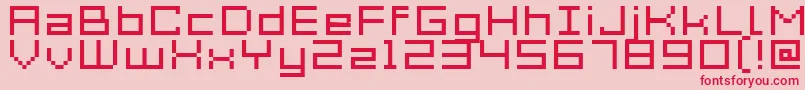 Acme7WideXtnd-Schriftart – Rote Schriften auf rosa Hintergrund