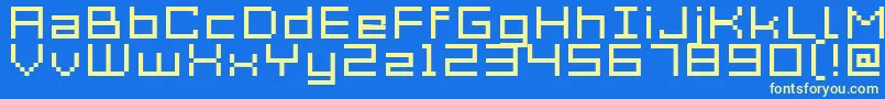 Acme7WideXtnd-fontti – keltaiset fontit sinisellä taustalla
