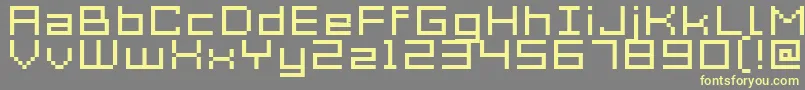 フォントAcme7WideXtnd – 黄色のフォント、灰色の背景