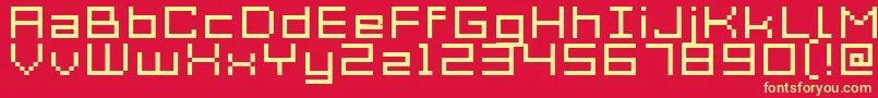 Acme7WideXtnd-fontti – keltaiset fontit punaisella taustalla