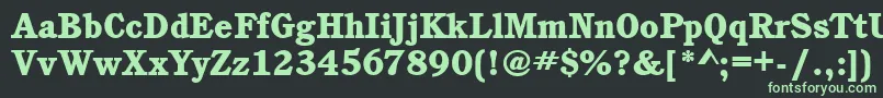 フォントCushingitcteehea – 黒い背景に緑の文字