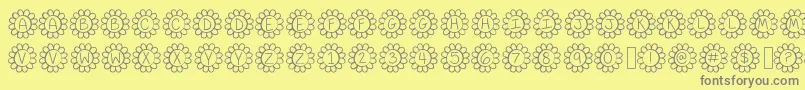 Fonte FlowerPowerThin – fontes cinzas em um fundo amarelo