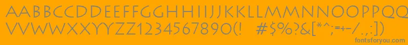 Wizard2-fontti – harmaat kirjasimet oranssilla taustalla