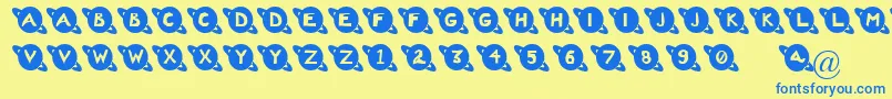 フォントSaturn – 青い文字が黄色の背景にあります。