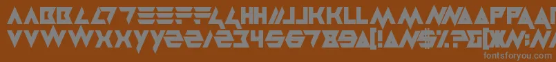 Masterblast-fontti – harmaat kirjasimet ruskealla taustalla