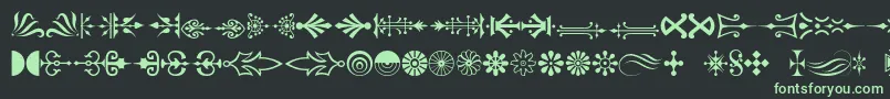 Pcornaments-fontti – vihreät fontit mustalla taustalla