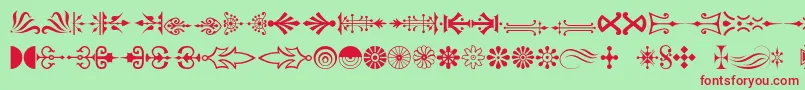 Pcornaments Font – Red Fonts on Green Background