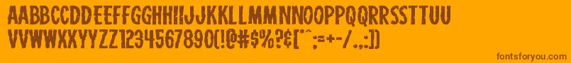 Fonte Carnivalcorpseexpand – fontes marrons em um fundo laranja