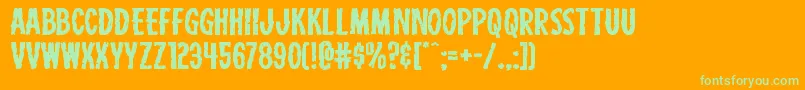 Carnivalcorpseexpand-Schriftart – Grüne Schriften auf orangefarbenem Hintergrund