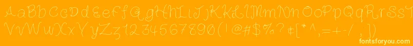 Louiseshand-fontti – keltaiset fontit oranssilla taustalla