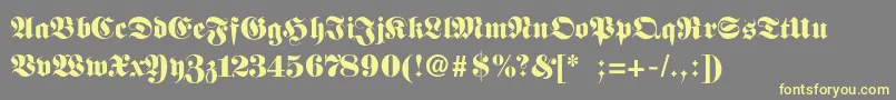 FettefrakturSemibold Font – Yellow Fonts on Gray Background