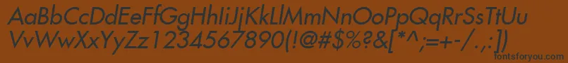 Fujiyama2Italic-fontti – mustat fontit ruskealla taustalla