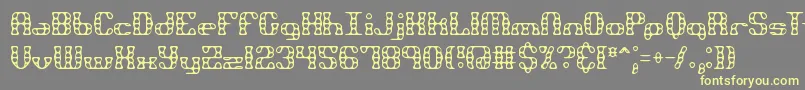 BrassKnuckleBrk Font – Yellow Fonts on Gray Background