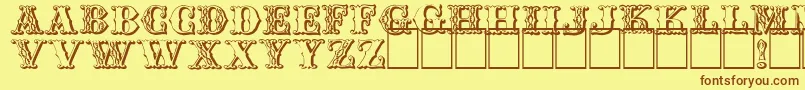 フォントChipperb – 茶色の文字が黄色の背景にあります。