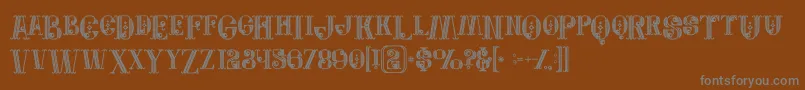 Czcionka Jewelboldgrunge – szare czcionki na brązowym tle