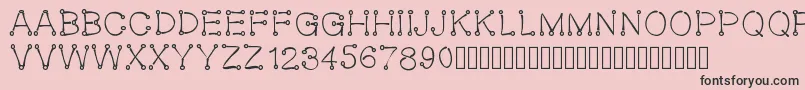 Oeillet Font – Black Fonts on Pink Background