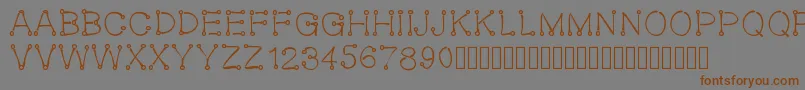 Oeillet Font – Brown Fonts on Gray Background