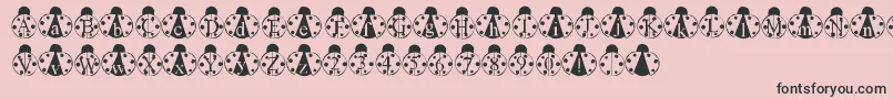 フォントLmsLondonbugs – ピンクの背景に黒い文字