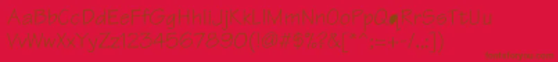 Tekton-fontti – ruskeat fontit punaisella taustalla