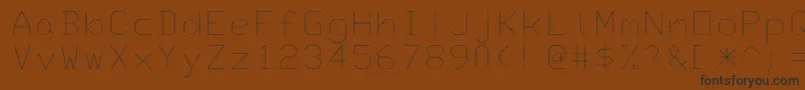 Шрифт Monotxt – чёрные шрифты на коричневом фоне