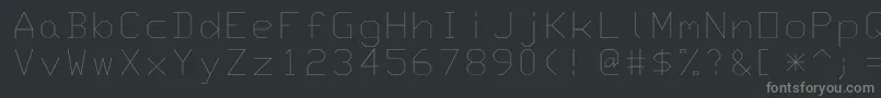 フォントMonotxt – 黒い背景に灰色の文字