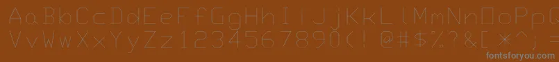 フォントMonotxt – 茶色の背景に灰色の文字