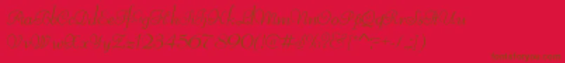Czcionka ReliantLimitedFreeVersion – brązowe czcionki na czerwonym tle