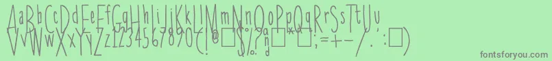 フォントSkinnychick – 緑の背景に灰色の文字
