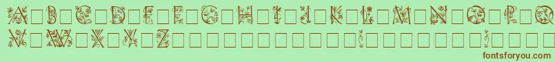 Fonte LilithInitialsMedium – fontes marrons em um fundo verde