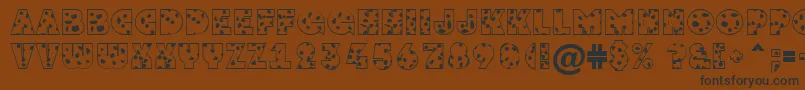 GrotosptNormal Font – Black Fonts on Brown Background
