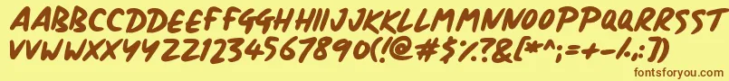 フォントSignboard – 茶色の文字が黄色の背景にあります。