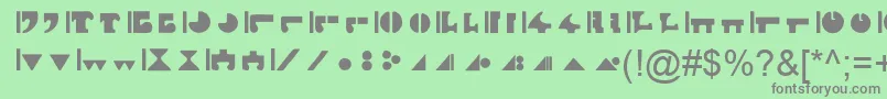 InterlacByBluePanther-fontti – harmaat kirjasimet vihreällä taustalla