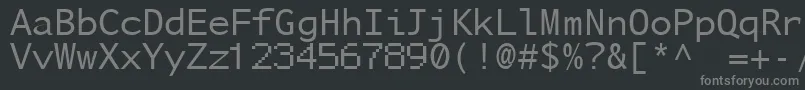 Fonte NuSansMonoDemo – fontes cinzas em um fundo preto