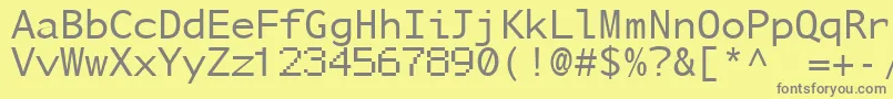 Шрифт NuSansMonoDemo – серые шрифты на жёлтом фоне