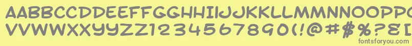 SfToontimeExtendedBold-fontti – harmaat kirjasimet keltaisella taustalla
