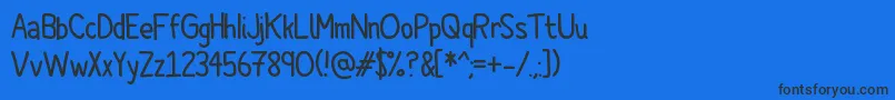 Cartoonero Font – Black Fonts on Blue Background